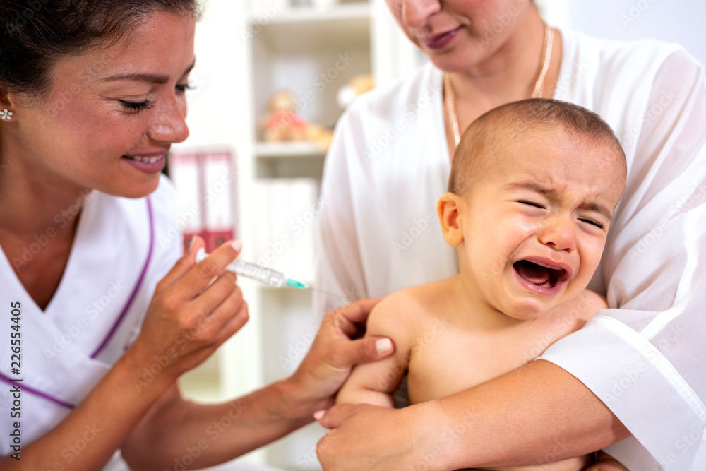 Baby having a theatrical objection to a vaccine Baby having a theatrical objection to a vaccine
