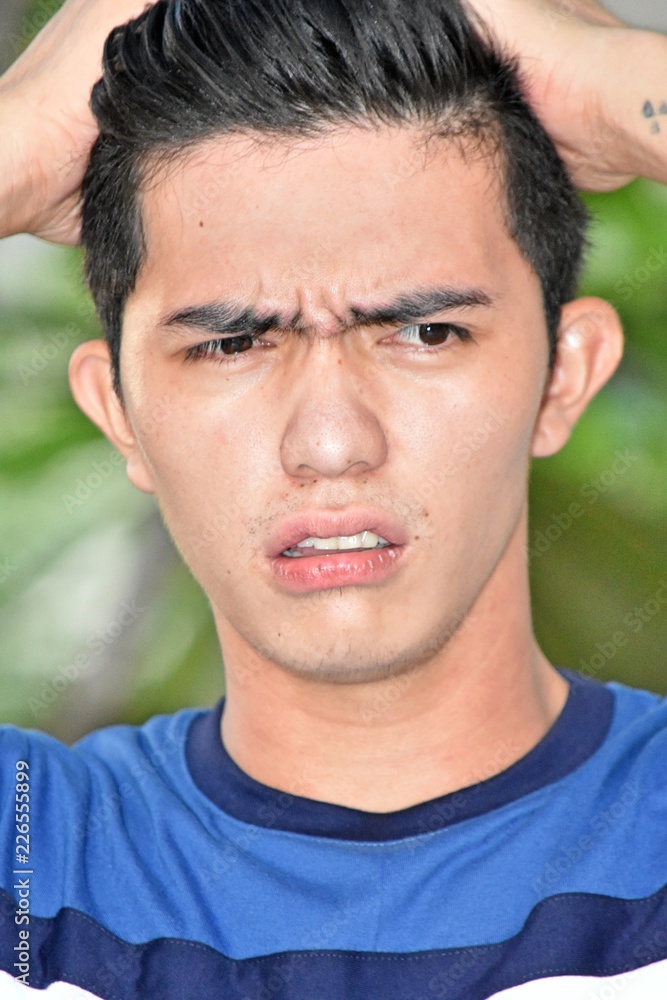 Obraz premium Confused Handsome Minority Male Person
