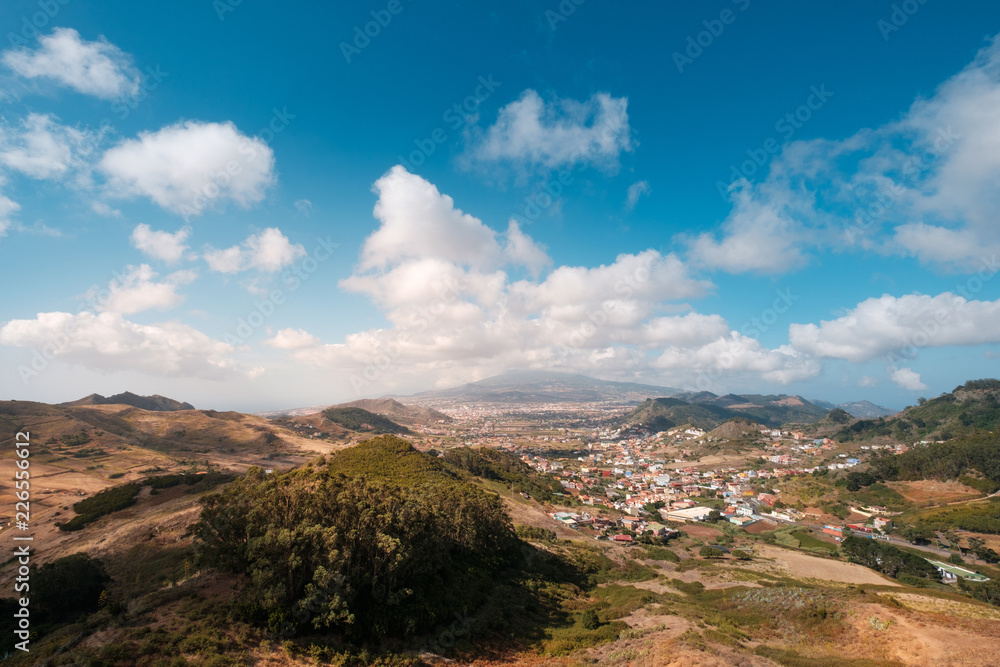 rural landscape panorama with town / village in valley and summer sky on sunny day, Tenerife, Spain