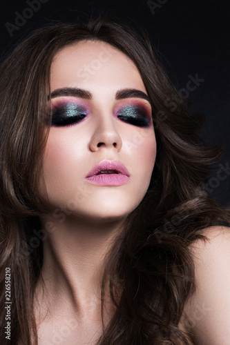 Wallpaper Mural Beauty portrait of a beautiful brunette on black background Torontodigital.ca