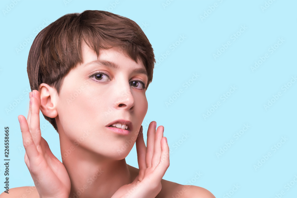 Beautiful woman. Female face close up. Portrait of young caucasian woman at studio isolated on white. Fresh skin and beauty concept. Short haircut, long neck, perfect skin Beautiful woman. Female face close up. Portrait of young caucasian woman at studio isolated on white. Fresh skin and beauty concept. Short haircut, long neck, perfect skin