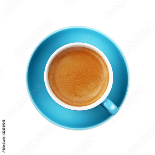 Full espresso coffee in blue cup close up isolated