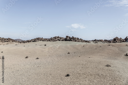 Teide national park area conformed by rocky areas and sand on a sunny day, Tenerife island photo