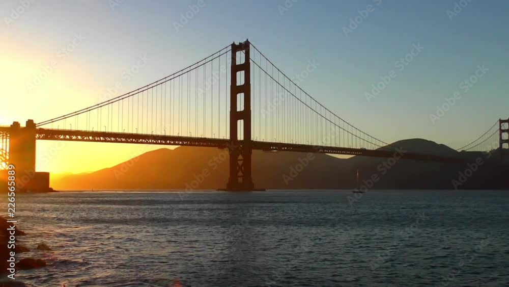 The Golden Gate Bridge at sunset as seen from Chrissy Field, San Francisco, California, USA The Golden Gate Bridge at sunset as seen from Chrissy Field, San Francisco, California, USA