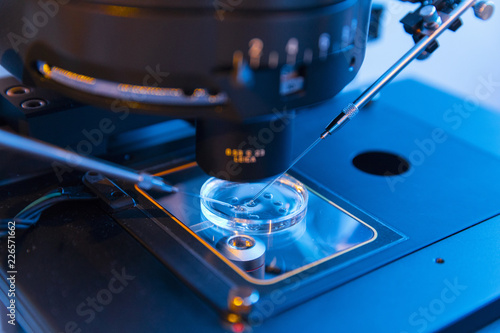 Man Technician working with laboratory equipment