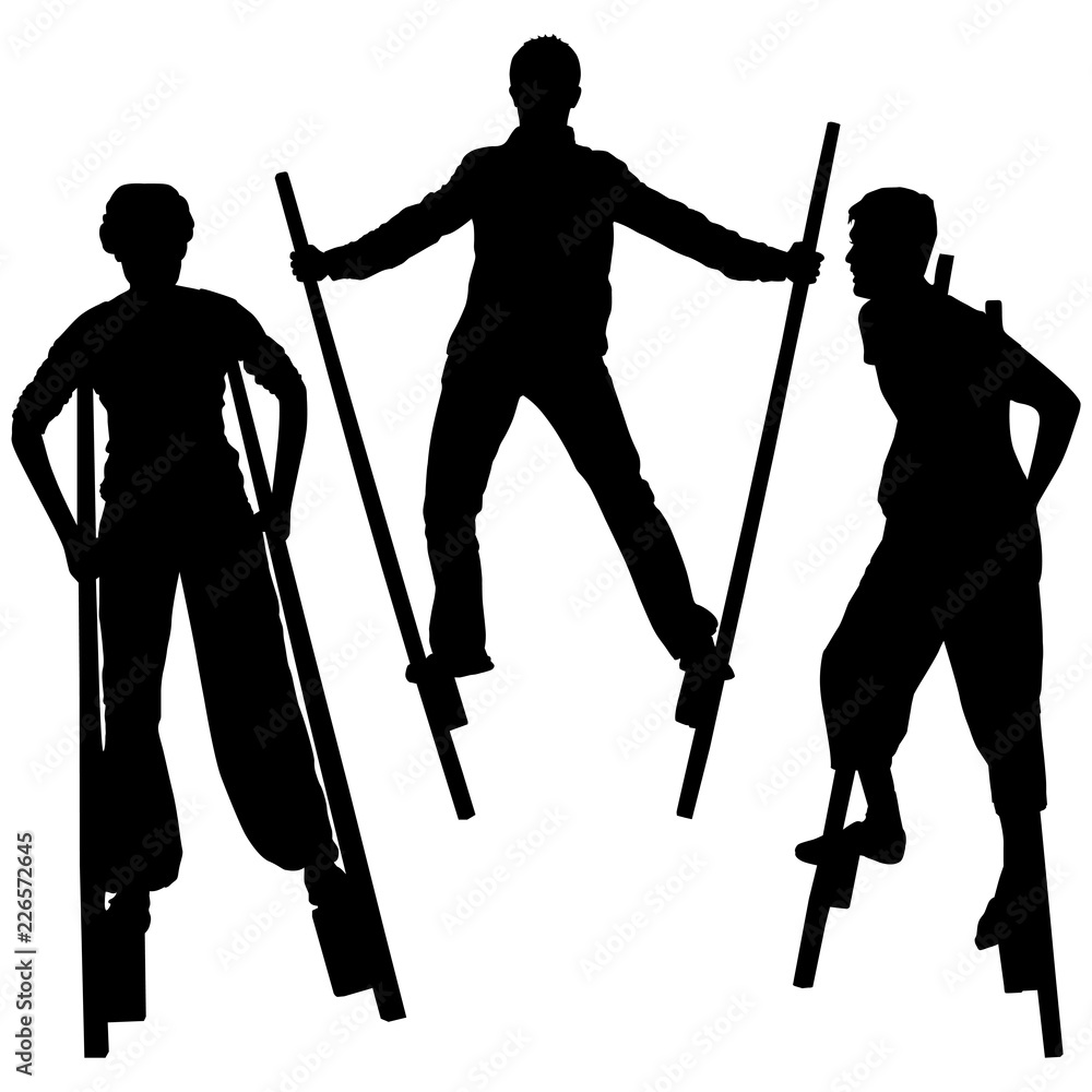 Silhouettes of three young men and women standing on stilts. Cheerful