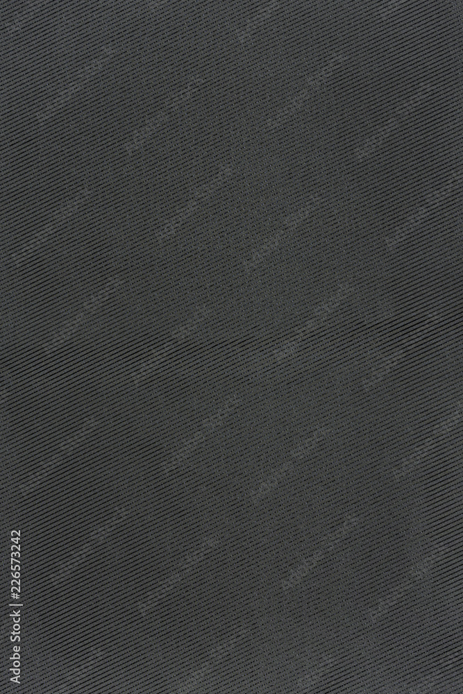 Highly detailed all over background texture of black and silver gray stripe textile in synthetic fabric. Highly detailed all over background texture of black and silver gray stripe textile in synthetic fabric.