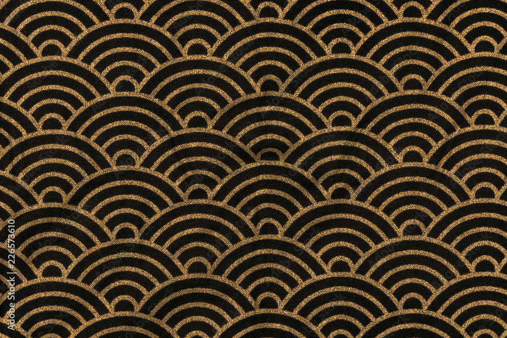 Highly detailed all over background texture of traditional japanese black and gold rainbow-shaped pattern design textile in synthetic fabric. Highly detailed all over background texture of traditional japanese black and gold rainbow-shaped pattern design textile in synthetic fabric.