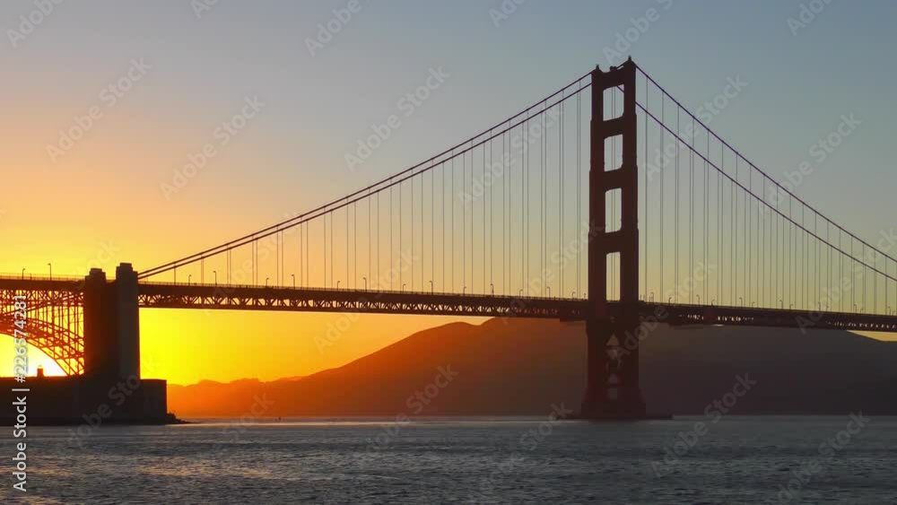 The Golden Gate Bridge at sunset as seen from Chrissy Field, San Francisco, California, USA The Golden Gate Bridge at sunset as seen from Chrissy Field, San Francisco, California, USA