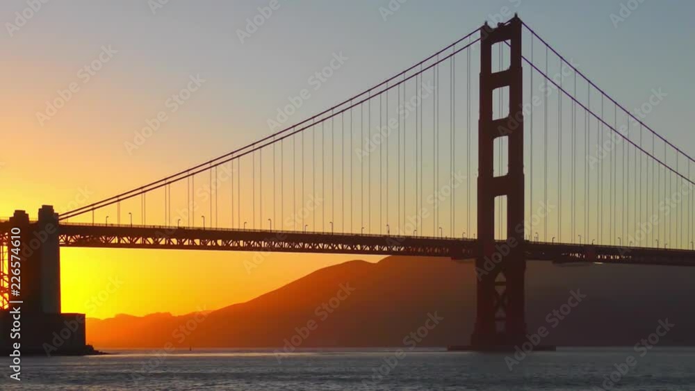 The Golden Gate Bridge at sunset as seen from Chrissy Field, San Francisco, California, USA The Golden Gate Bridge at sunset as seen from Chrissy Field, San Francisco, California, USA