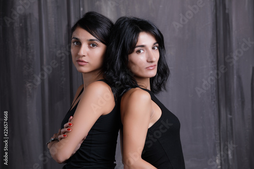 Two sisters studio portrait