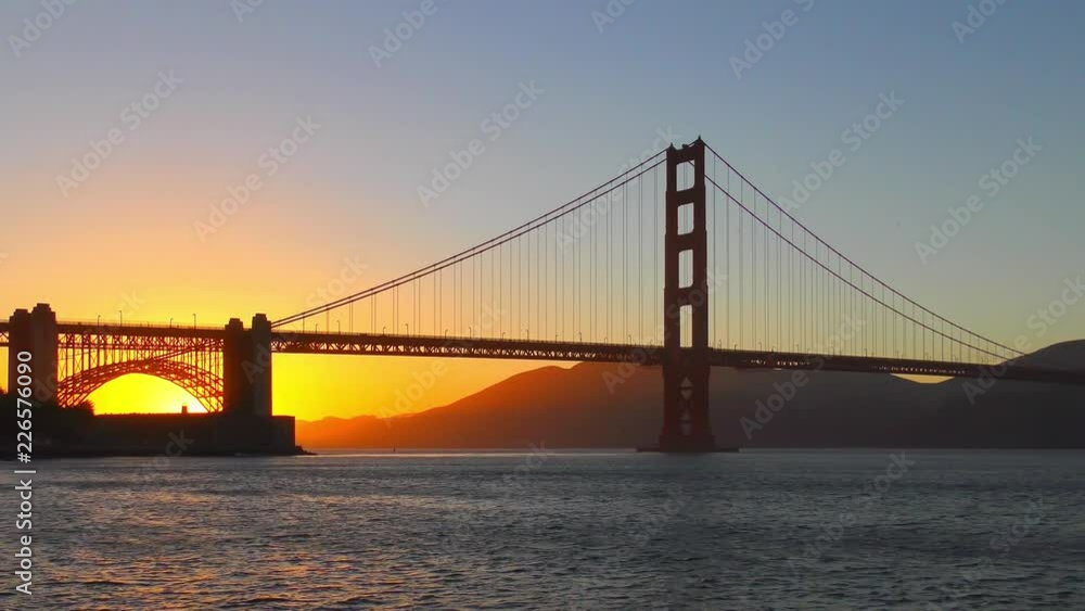 The Golden Gate Bridge at sunset as seen from Chrissy Field, San Francisco, California, USA The Golden Gate Bridge at sunset as seen from Chrissy Field, San Francisco, California, USA