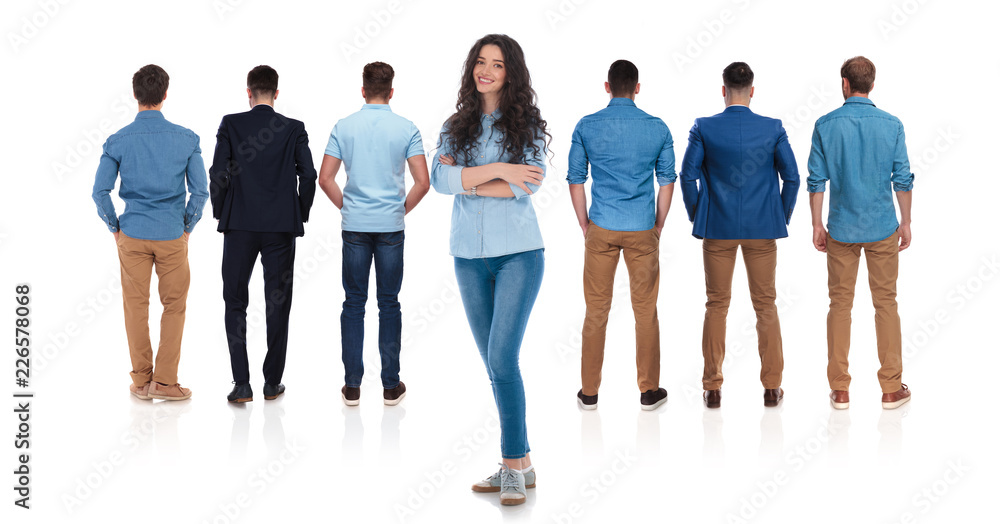 © Viorel Sima - back view of relaxed group of men and woman leader