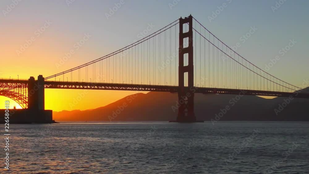 The Golden Gate Bridge at sunset as seen from Chrissy Field, San Francisco, California, USA The Golden Gate Bridge at sunset as seen from Chrissy Field, San Francisco, California, USA