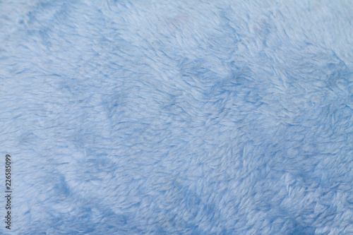 the texture of the fur is genuine faux blue background soft warm cozy