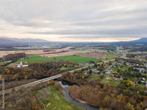 Aerial of the small town of Elkton, Virginia in the Shenandoah Valley with Mountains in the Distance