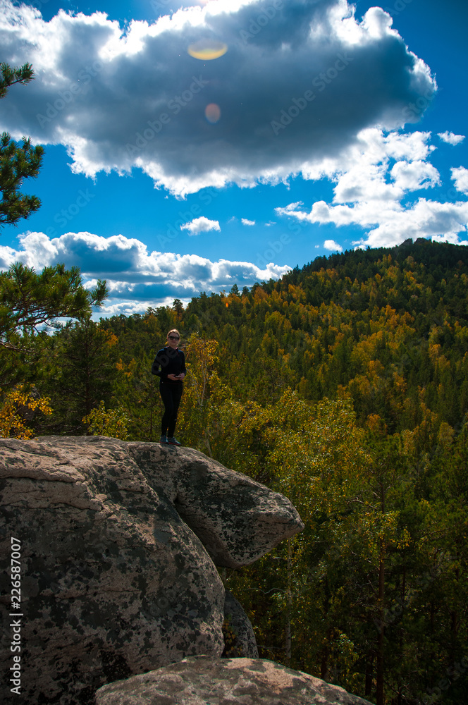 Tourist girl and beautiful autumn nature