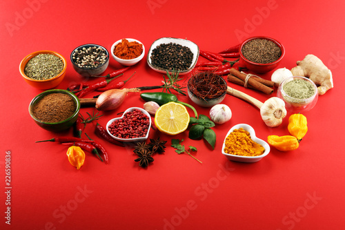 Spices and herbs on table. Food and cuisine ingredients. © beats_
