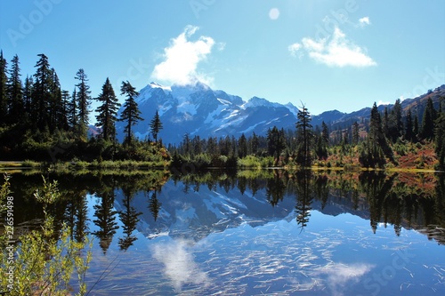 Stunning view of Mount Shuksan and its reflection in Picture Lake on a tranquil morning in September © octobersun