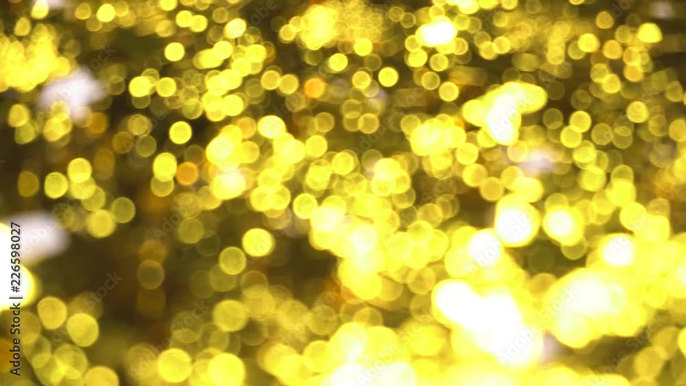 Golden blurred background from glitters Golden blurred background from glitters