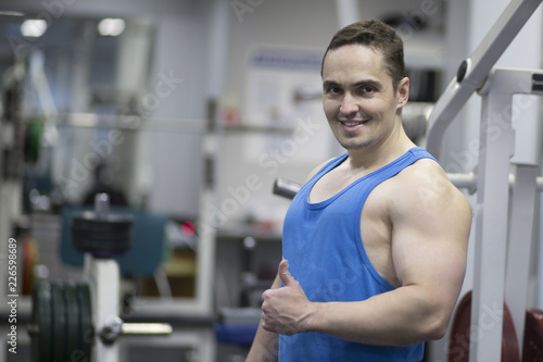 young man working out in gym