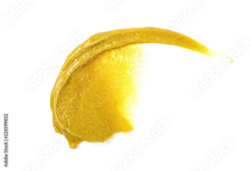 Fotografie, Obraz Mustard sauce. Splash of mustard on a white background.