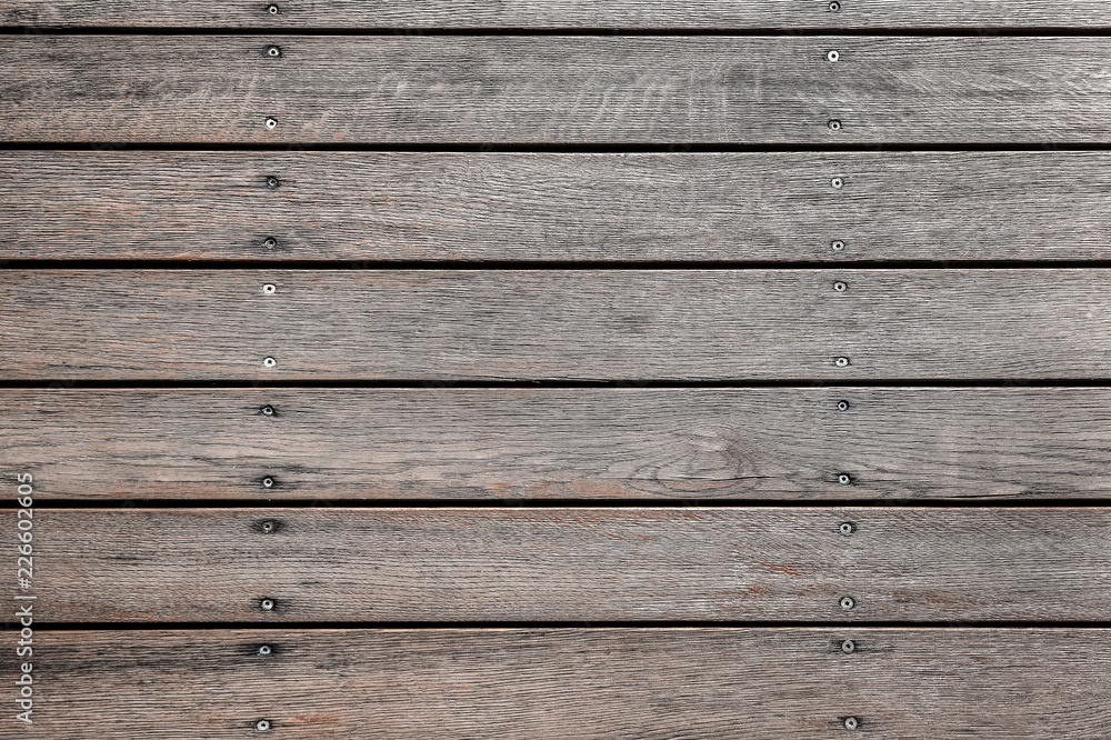 Old grey wooden texture for background or mockup. Old wood texture close up. Barn wall texture or rustic fence Grey flat wood banner billboard or signboard Old grey wooden texture for background or mockup. Old wood texture close up. Barn wall texture or rustic fence Grey flat wood banner billboard or signboard