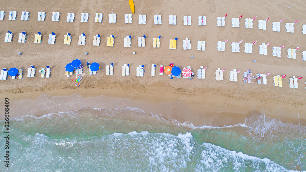 Aerial view of Beach. Holiday, Umbrellas, sand and ocean.