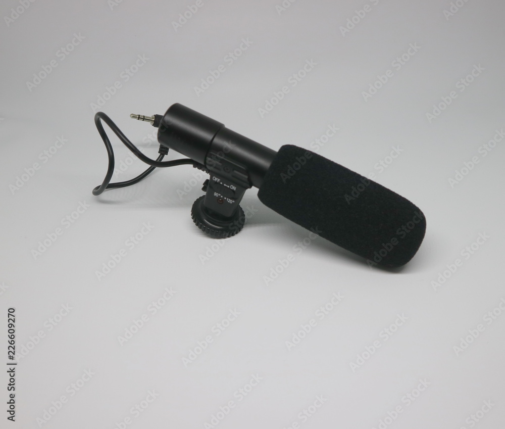 Shotgun Michrophone isolated on white background Shotgun Michrophone isolated on white background
