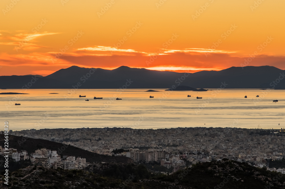 Sunset view of ships in Piraeus port, Athens in Greece