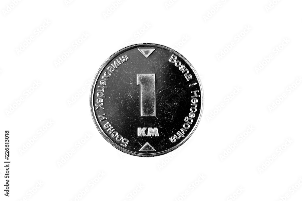 A macro image of a Bosnian 1 convertible mark coin isolated on a white background A macro image of a Bosnian 1 convertible mark coin isolated on a white background