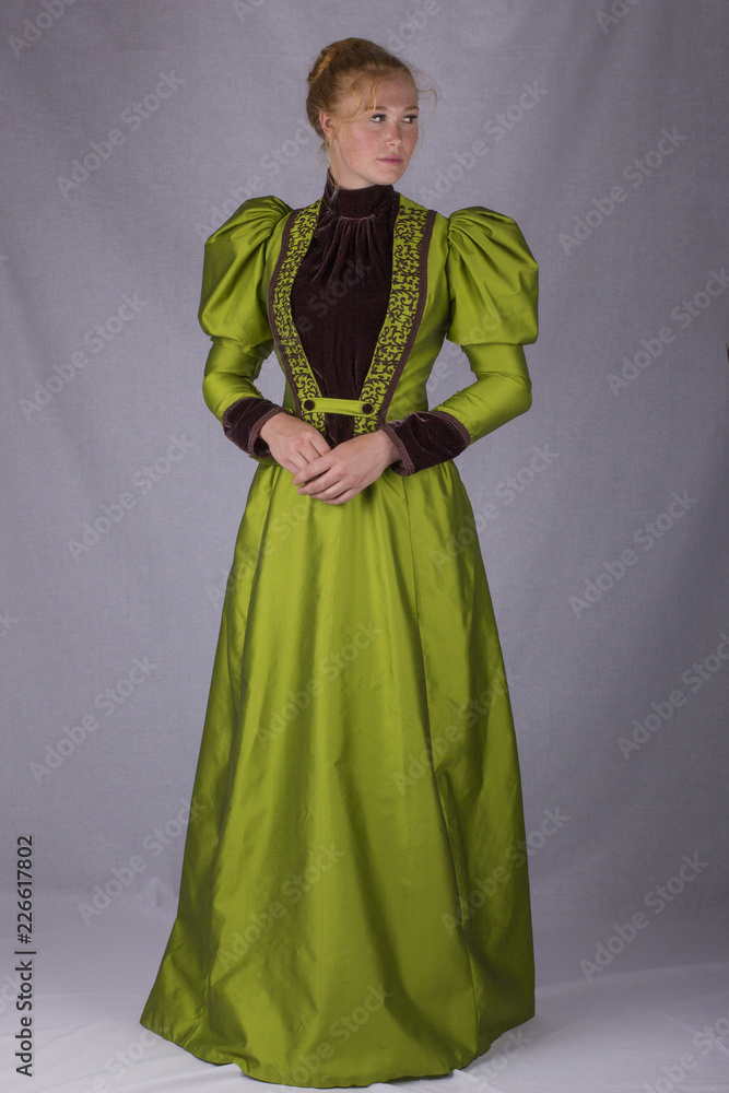 Victorian woman in green ensemble Victorian woman in green ensemble