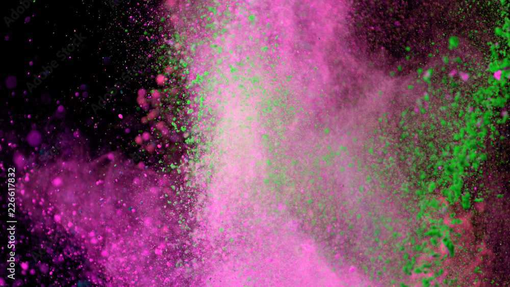 Multi-color powder explosion on black background Multi-color powder explosion on black background
