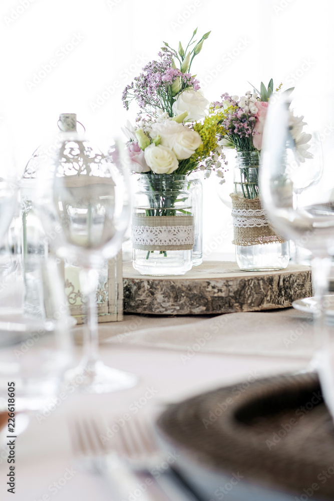 rustic romantic pastel flower arrangement decoration on wedding table