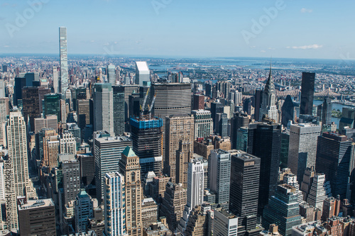 Aerial view of New York City - USA. Manhattan downtown skyline and skyscrapers from the Empire State Building in the morning. © Xavier Lorenzo
