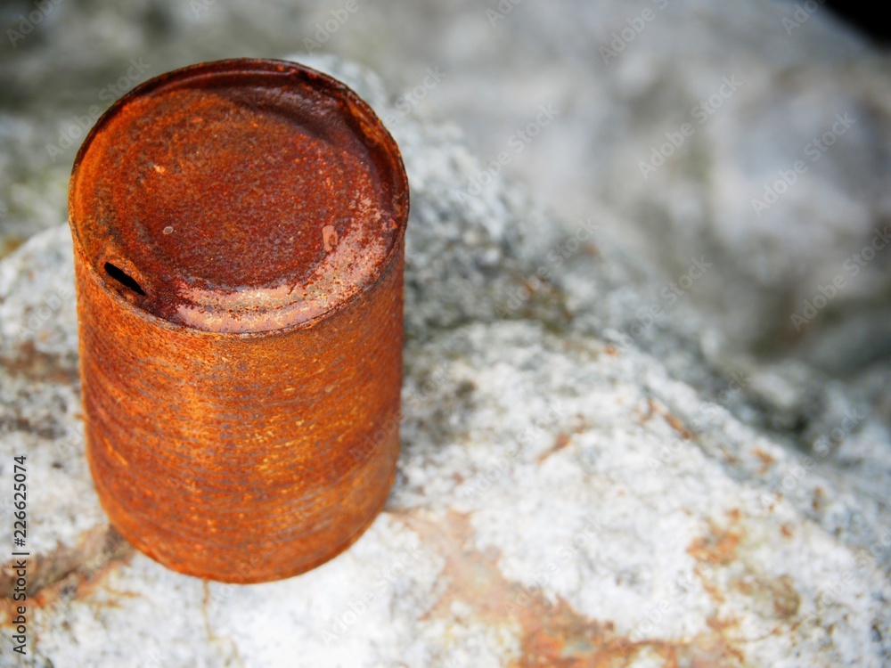 Old tin can with rust