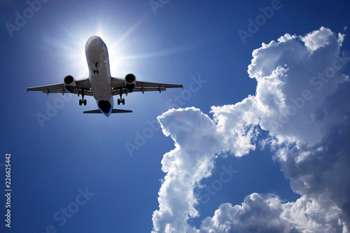 passenger jet plane flying in the sky