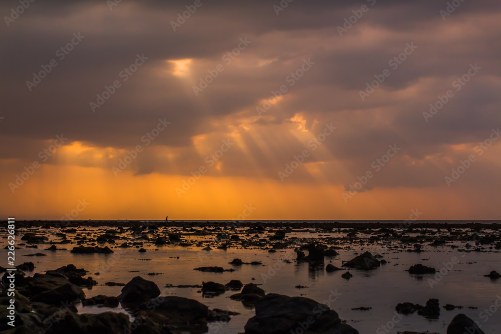 Obraz premium Light through the clouds sea Nai Yang Beach Phuket Thailand