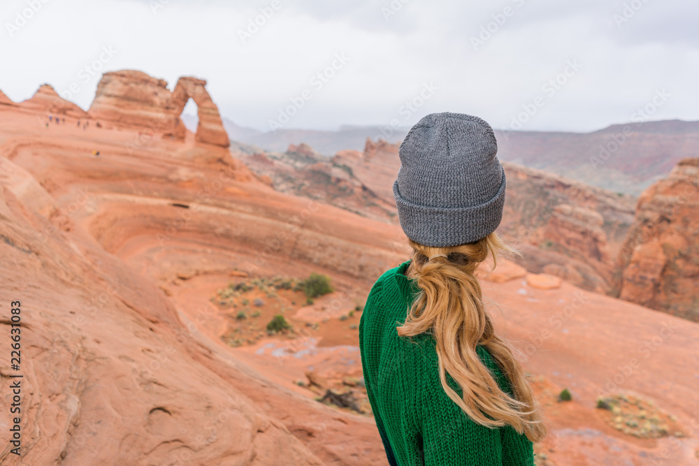 Girl overlooking red mountains Utah