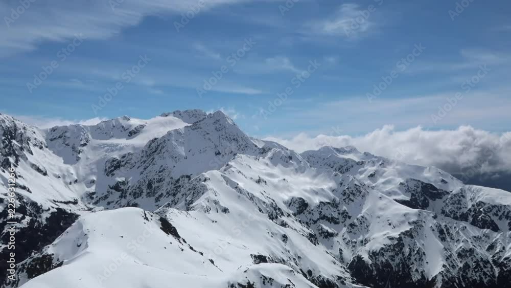 Avalanche Peak Summit view of Mt Rolleston and the surrounding snow alps Avalanche Peak Summit view of Mt Rolleston and the surrounding snow alps