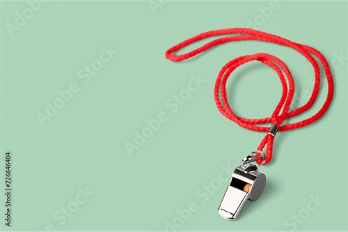 Sports whistle with a lace. It is photo