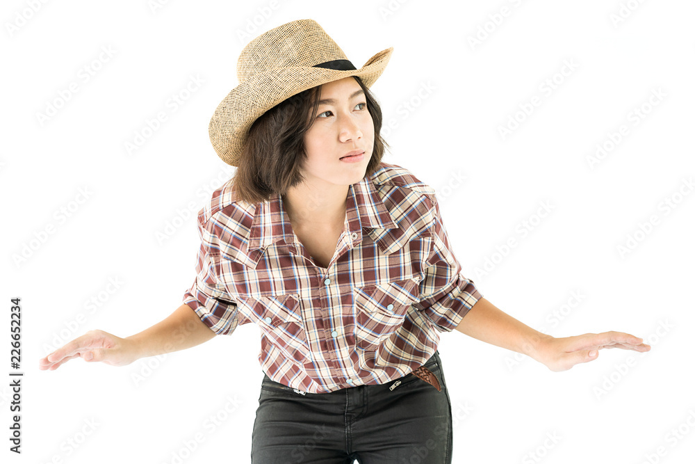 Young woman in a plaid shirt posing in studio on white background Young woman in a plaid shirt posing in studio on white background