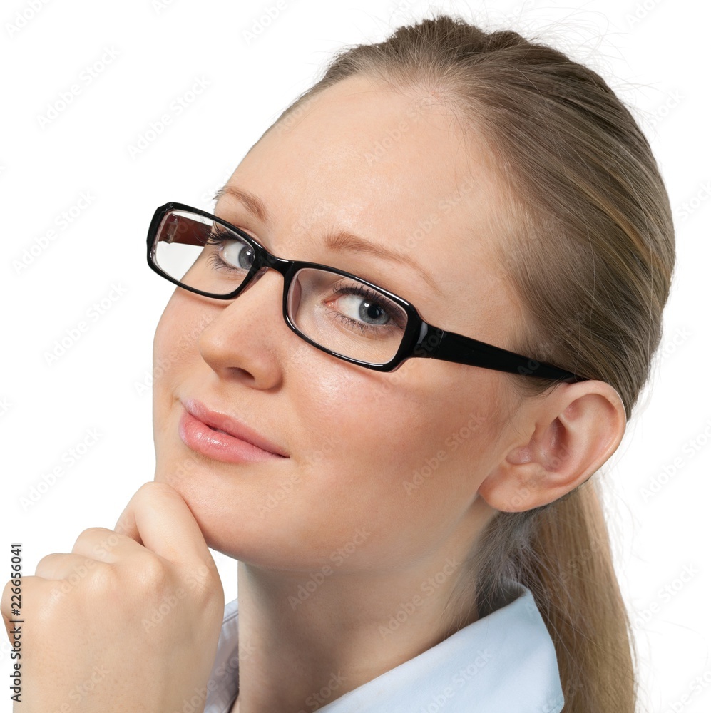 Young Woman with Glasses Stroking Chin - Isolated Young Woman with Glasses Stroking Chin - Isolated