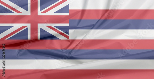 Fabric flag of Hawaii. Crease of Hawaii flag background, The states of America, Eight alternating horizontal stripes of white red and blue with a Union flag in the canton.