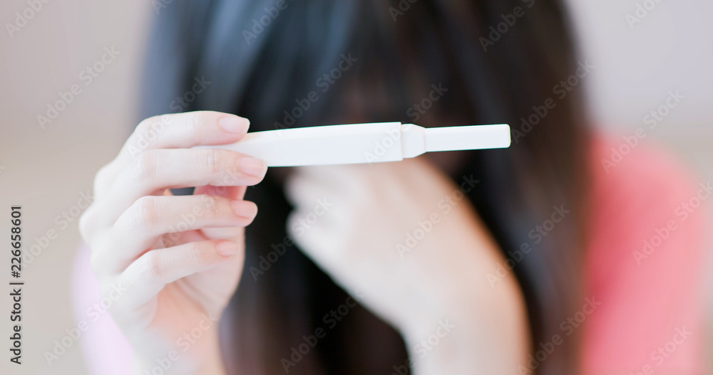 woman take pregnancy test woman take pregnancy test