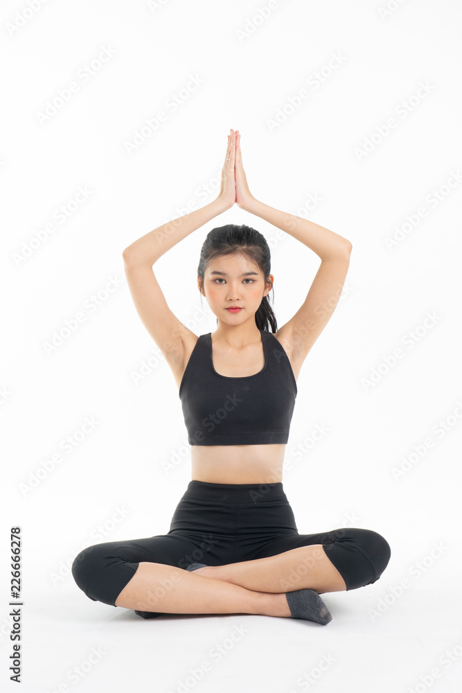 Sporty young asian woman doing yoga practice isolated on white background - concept healthy life fitness for slim. Sporty young asian woman doing yoga practice isolated on white background - concept healthy life fitness for slim.