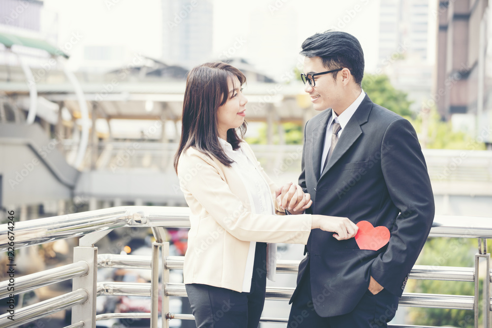 Businesswoman fall in love with CEO. love in the office. Loving concept