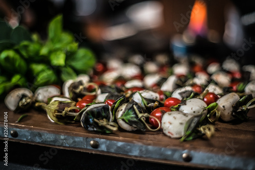 Caprese Skewer with blurred flames