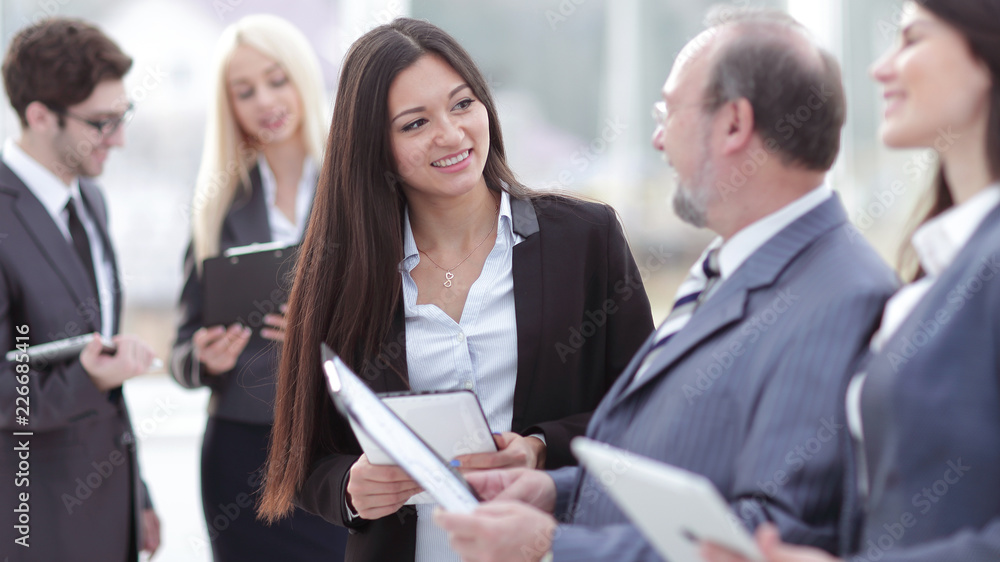 close up.group of business people preparing to start a business meeting close up.group of business people preparing to start a business meeting