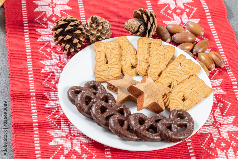 christmas cookies and decorations on a decorated christmas table christmas cookies and decorations on a decorated christmas table